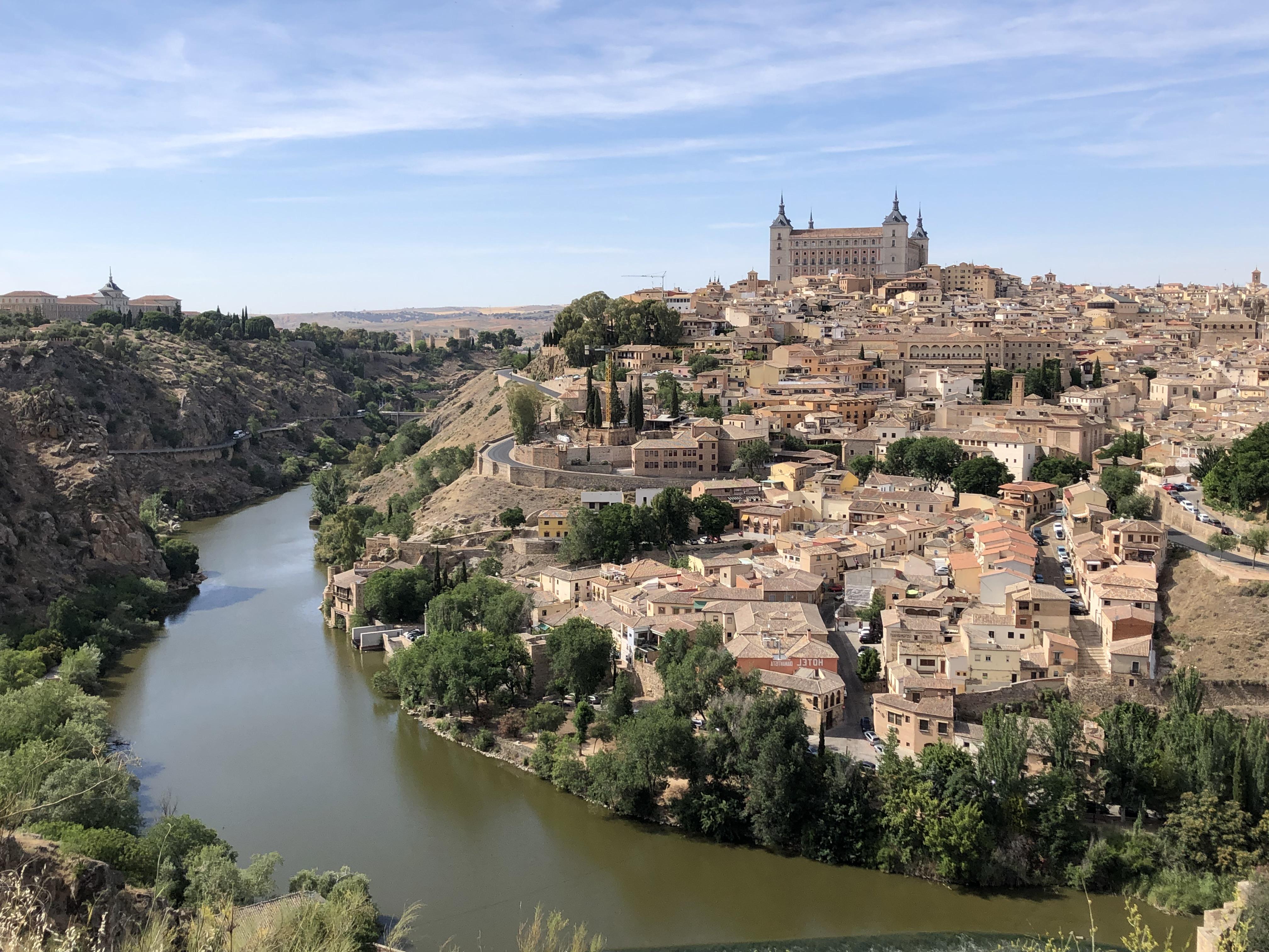 A river running along side the city of Toledo